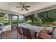 Relaxing enclosed porch with outdoor furniture and natural lighting at 5237 Gateway Ave, Orlando, FL 32821