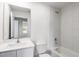 A bathroom features modern fixtures, tile accents, and a clean, bright design at 667 Bay Leaf Dr, Kissimmee, FL 34759