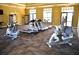 A spacious gym offers treadmills, exercise bikes and weight training machines at 667 Bay Leaf Dr, Kissimmee, FL 34759