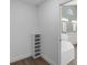 Bathroom with double sink vanity, soaking tub, modern fixtures and finishes, and decorative shelving unit at 762 Lake Como Dr, Lake Mary, FL 32746