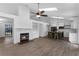 Open floor plan with fireplace, built-ins, and butcher block island with seating at 762 Lake Como Dr, Lake Mary, FL 32746