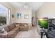 Relaxing living room featuring neutral carpet, plush sofas, and a mounted television at 856 Bentley Green Cir, Winter Springs, FL 32708