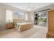 Spacious main bedroom with sliding glass door access to screened patio and backyard pool at 856 Bentley Green Cir, Winter Springs, FL 32708