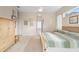 Bright main bedroom featuring a ceiling fan, neutral color scheme and carpet, and ensuite bathroom access at 856 Bentley Green Cir, Winter Springs, FL 32708
