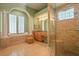 Luxurious bathroom with a walk-in shower, soaking tub, and a double vanity at 9128 Phillips Grove Ter, Orlando, FL 32836