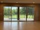 Sliding glass doors leading to the pool and backyard area at 922 Suffolk Pl, Davenport, FL 33896