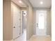 Inviting foyer with neutral paint and sleek tile flooring at 922 Suffolk Pl, Davenport, FL 33896