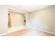 View of a living room with carpet, and tile floor leading to the kitchen at 922 Suffolk Pl, Davenport, FL 33896