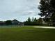 Community amenity featuring a tennis court and sand volleyball court at 922 Suffolk Pl, Davenport, FL 33896