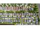 An aerial view showcases the layout of the community and proximity to nearby amenities at 10299 Cypress Knee Cir, Orlando, FL 32825