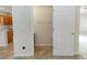 Bathroom featuring tile flooring and a white door at 10299 Cypress Knee Cir, Orlando, FL 32825