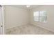 Bright bedroom featuring carpet, natural light and a ceiling fan at 10299 Cypress Knee Cir, Orlando, FL 32825