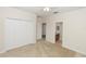 Bedroom features a closet, ceiling fan and a door that leads to the bathroom at 10299 Cypress Knee Cir, Orlando, FL 32825