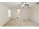 Large main bedroom featuring carpet and an ensuite bath at 10299 Cypress Knee Cir, Orlando, FL 32825