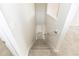 Carpeted stairs with white walls and bannister at 10299 Cypress Knee Cir, Orlando, FL 32825