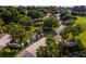 Aerial view of Legends Golf & Country Club, a lush residential community with pristine landscapes at 1097 Harmony Ln, Clermont, FL 34711