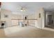 Upstairs loft area featuring a table and chair with views of the home's interior at 1097 Harmony Ln, Clermont, FL 34711