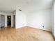 Spacious bedroom with hardwood floors and neutral walls provides a blank canvas for relaxation and personalization at 1131 Tyler Lake Cir, Orlando, FL 32839
