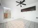 Clean bedroom with tile flooring, a ceiling fan and one window at 1131 Tyler Lake Cir, Orlando, FL 32839