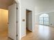 Sunlit bedroom with a window and a walk-in closet offers bright living space, ideal for comfort and style at 1131 Tyler Lake Cir, Orlando, FL 32839
