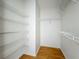 Organized closet with shelves offers ample storage solutions, perfect for maximizing space at 1131 Tyler Lake Cir, Orlando, FL 32839