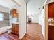 Hallway view of the bathroom, dining area and kitchen at 1131 Tyler Lake Cir, Orlando, FL 32839