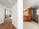 Hallway offering views of the bathroom and living room that highlight an open flow at 1131 Tyler Lake Cir, Orlando, FL 32839