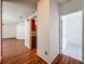 Hallway between the living area and bedrooms with views of the kitchen at 1131 Tyler Lake Cir, Orlando, FL 32839