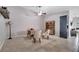 Office space featuring carpet floors, light walls, wood furniture, and a ceiling fan at 11854 Delfina Ln, Orlando, FL 32827