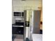 This kitchen features stainless steel appliances at 1256 N Pine Hills Rd, Orlando, FL 32808