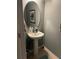 This is a shot of a cozy bathroom featuring a simple design and lovely tile flooring at 13252 Vennetta Way, Windermere, FL 34786
