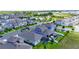 Aerial view of a residential neighborhood showcasing well-maintained homes and community amenities at 13993 Title Way, Winter Garden, FL 34787