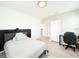 Comfortable bedroom featuring modern decor and a sleek desk area at 13993 Title Way, Winter Garden, FL 34787