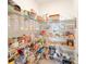 Well-organized pantry with ample shelving and storage space for all your kitchen essentials at 13993 Title Way, Winter Garden, FL 34787