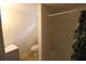 View of a bathroom with a sink, toilet, and shower with a leaf-patterned shower curtain at 16320 3Rd St, Umatilla, FL 32784