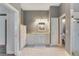 Spacious bathroom with a double sink vanity, tiled floor, and a separate toilet room at 1741 Edgewater Dr, Mount Dora, FL 32757