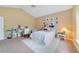 Cozy bedroom featuring vaulted ceiling, plush carpet, and decorative decor at 1741 Edgewater Dr, Mount Dora, FL 32757