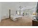 Spacious main bedroom with high ceilings, a ceiling fan, and lots of natural light at 1741 Edgewater Dr, Mount Dora, FL 32757