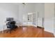 Bright office space with wood floors and view of an entry way at 1741 Edgewater Dr, Mount Dora, FL 32757