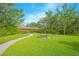 Community park featuring a covered picnic pavilion and lush green space, perfect for outdoor gatherings at 1785 Red Canyon Dr, Kissimmee, FL 34744