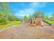 Community playground featuring slides, climbing structures, and picnic area for Gathering fun at 1785 Red Canyon Dr, Kissimmee, FL 34744