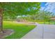 Gathering-friendly playground surrounded by lush greenery and walking paths at 1785 Red Canyon Dr, Kissimmee, FL 34744