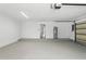 A clean and spacious garage with bright lighting at 1850 North St, Longwood, FL 32750