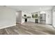 Stylish kitchen featuring stainless steel appliances and crisp white cabinetry at 1850 North St, Longwood, FL 32750