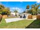 Large, fenced backyard with a paver patio perfect for outdoor entertaining and relaxation at 1911 Canton St, Orlando, FL 32803