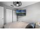 Bedroom featuring a large double door closet and modern ceiling fan at 1911 Canton St, Orlando, FL 32803