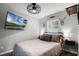 Cozy bedroom with stylish decor and a mounted TV at 1911 Canton St, Orlando, FL 32803