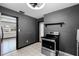 Kitchen featuring modern stainless steel appliances and tiled floors at 1911 Canton St, Orlando, FL 32803