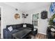 A cozy living room featuring a comfortable gray sectional sofa at 1911 Canton St, Orlando, FL 32803
