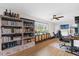 Spacious living area with bookshelves, a TV, desk and natural light at 2098 Heathwood St, Deltona, FL 32725